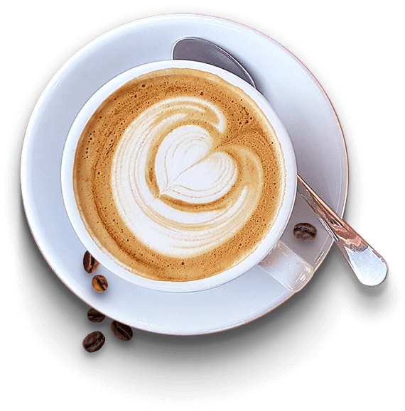 Una taza de café vista desde arriba. Con la espuma se han dibujado unas formas de corazón.
